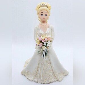 Avon The Kneaded Angel Bride Figurine By Carol Graziano.